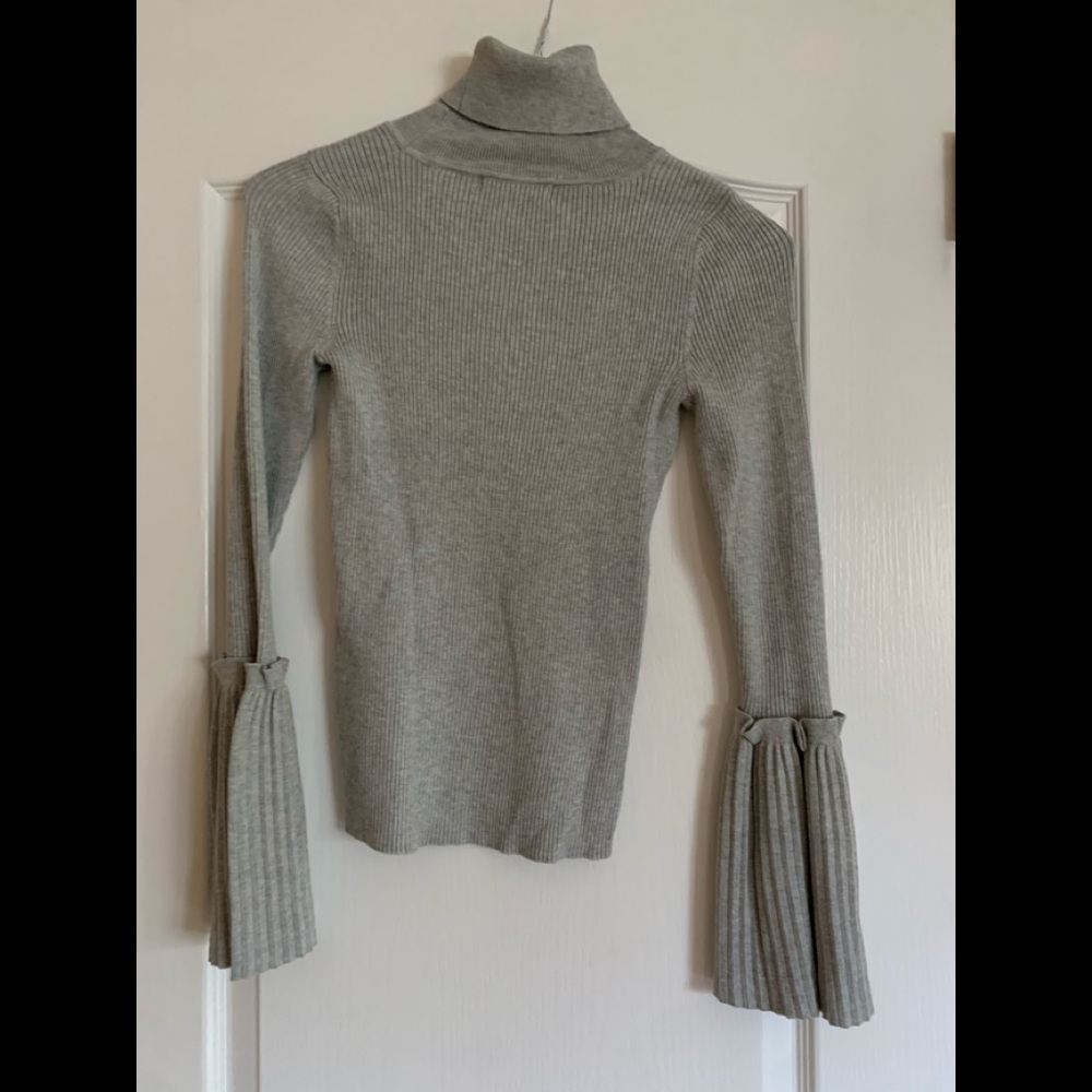 Romeo and Juliet knit turtleneck sweater